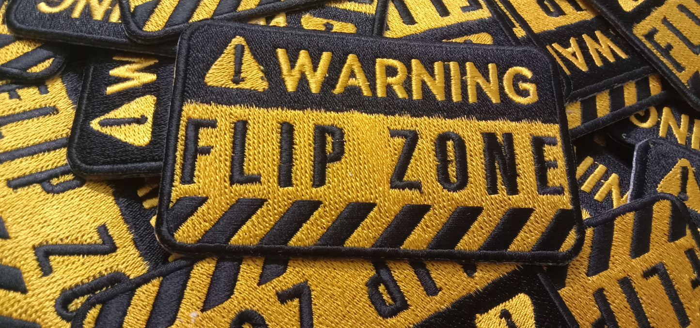 Warning Flip Zone (™)